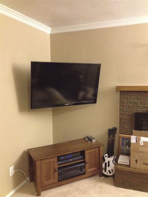 Mounting a tv in a corner wall - Install the mount on the outside of the 68 inch wide wall where the outlet and 2 coax are and when the TV isn't on and being used, it can rest straight and flush. I'm looking for a good quality mount to move the TV to the corner, facing the living room.